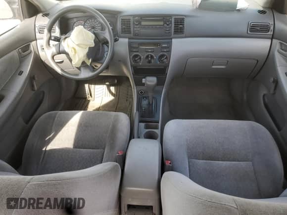 2003 Toyota Corolla CE с VIN JTDBR32E732012227, выставлен на аукционе Copart как лот 80644055 с пробегом Не указан миль и Списание • Salvage title. История ставок и продаж доступна на DreamBid. Изображение 8.