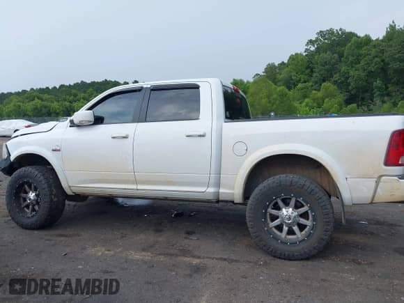 2012 Ram 1500 Sport with VIN 1C6RD7MT4CS154994, listed as a IAAI auction lot 42818900 with 117,437 mi miles and . Bid and sale history available at DreamBid. Image 14.
