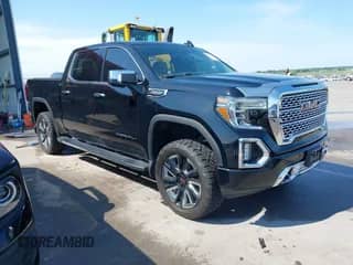 2019 GMC Sierra 1500 Denali z VIN 3GTU9FEL2KG232059, wystawiony jako IAAI lot #42753332 z przebiegiem 62 508 mil mil oraz . Historia ofert i sprzedaży dostępna na DreamBid. Obrazek 1.