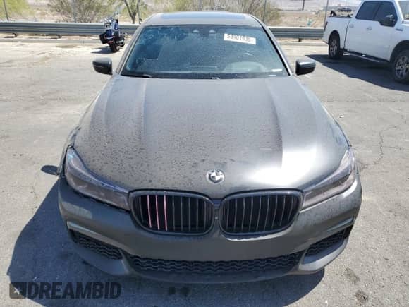 2019 BMW 7 Series 750i z VIN WBA7F0C50KGM25066, wystawiony jako Copart lot #53901935 z przebiegiem 65 724 mil mil oraz Szkoda całkowita • Salvage title. Historia ofert i sprzedaży dostępna na DreamBid. Obrazek 5.