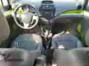 2013 Chevrolet Spark LT z VIN KL8CC6S96DC555101, wystawiony jako Copart lot #80859885 z przebiegiem 124 388 mil mil oraz Szkoda całkowita • Salvage title. Historia ofert i sprzedaży dostępna na DreamBid. Obrazek 8.