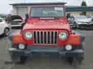 2001 Jeep Wrangler Sport with VIN 1J4FA49S11P339047, listed as a Copart auction lot 85923625 with 144,267 mi miles and Salvage title. Bid and sale history available at DreamBid. Image 5.