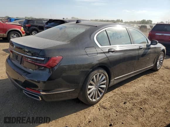 2022 BMW 7 Series 740i xDrive with VIN WBA7T4C02NCH98385, listed as a Copart auction lot 71987175 with 23,985 mi miles and Salvage title. Bid and sale history available at DreamBid. Image 3.