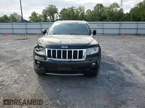 2013 Jeep Grand Cherokee Limited with VIN 1C4RJFBG1DC501808, listed as a Copart auction lot 70921765 with 81,646 mi miles and Salvage title. Bid and sale history available at DreamBid. Image 14.