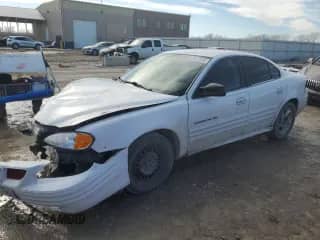 2002 Pontiac Grand Am SE z VIN 1G2NE52T51M550935, wystawiony jako Copart lot #43077585 z przebiegiem 180 350 mil mil oraz Szkoda całkowita • Salvage title. Historia ofert i sprzedaży dostępna na DreamBid. Obrazek 1.