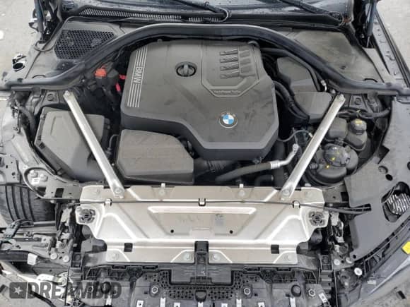 2022 BMW 4 Series 430i xDrive with VIN WBA43AT07NCH77310, listed as a Copart auction lot 84063004 with 31,954 mi miles and Salvage title. Bid and sale history available at DreamBid. Image 11.