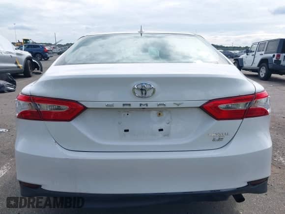 2020 Toyota Camry LE with VIN 4T1L11AKXLU329121, listed as a IAAI auction lot 43233720 with 46,485 mi miles and . Bid and sale history available at DreamBid. Image 16.
