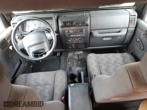 2003 Jeep Wrangler X z VIN 1J4FA39S23P359983, wystawiony jako Copart lot #59469005 z przebiegiem 118 585 mil mil oraz Czysty tytuł • Clean title. Historia ofert i sprzedaży dostępna na DreamBid. Obrazek 8.