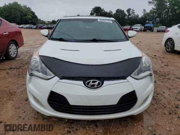 2013 Hyundai Veloster w/Black Int с VIN KMHTC6AD0DU149690, выставлен на аукционе Copart как лот 68201775 с пробегом 112 030 миль миль и Списание • Salvage title. История ставок и продаж доступна на DreamBid. Изображение 5.