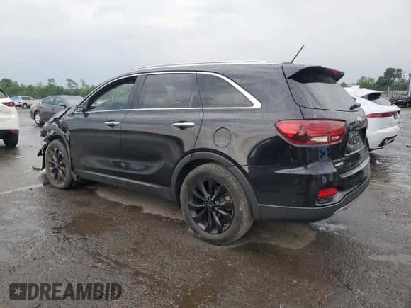 2020 Kia Sorento EX z VIN 5XYPH4A57LG710522, wystawiony jako Copart lot #60142965 z przebiegiem 94 776 mil mil oraz Szkoda całkowita • Salvage title. Historia ofert i sprzedaży dostępna na DreamBid. Obrazek 2.