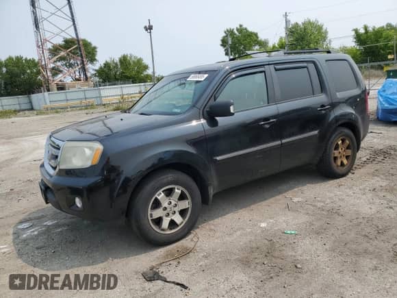 2009 Honda Pilot Touring with VIN 5FNYF38849B011613, listed as a Copart auction lot 58668495 with 299,928 mi miles and Clean title. Bid and sale history available at DreamBid. Image 1.