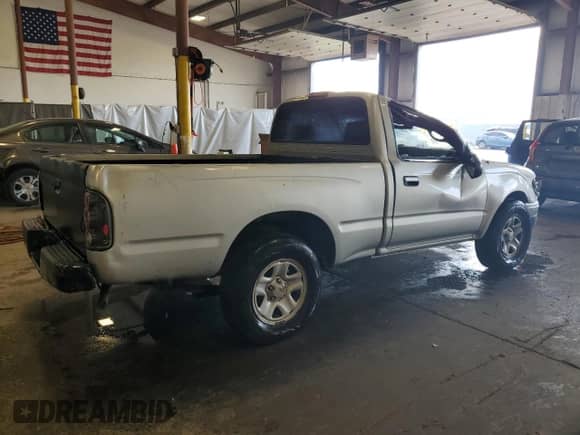 2002 Toyota Tacoma with VIN 5TENL42N72Z087380, listed as a Copart auction lot 84454855 with 291,069 mi miles and Salvage title. Bid and sale history available at DreamBid. Image 3.