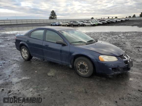 2006 Dodge Stratus SXT with VIN 1B3AL46T26N221018, listed as a Copart auction lot 81447344 with 184,644 mi miles and Salvage title. Bid and sale history available at DreamBid. Image 4.