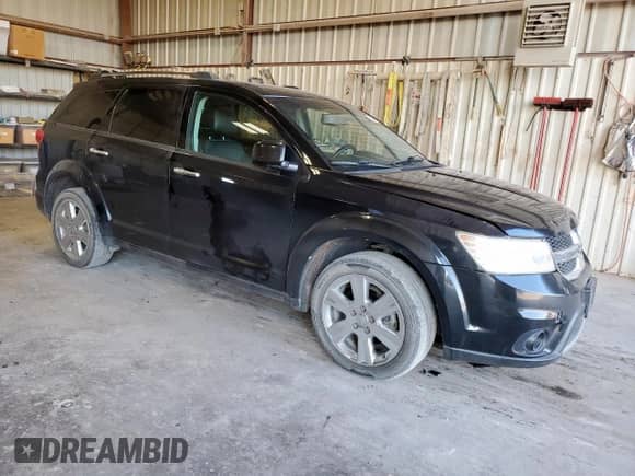 2012 Dodge Journey Crew with VIN 3C4PDCDGXCT271022, listed as a Copart auction lot 80489515 with 224,501 mi miles and Salvage title. Bid and sale history available at DreamBid. Image 4.
