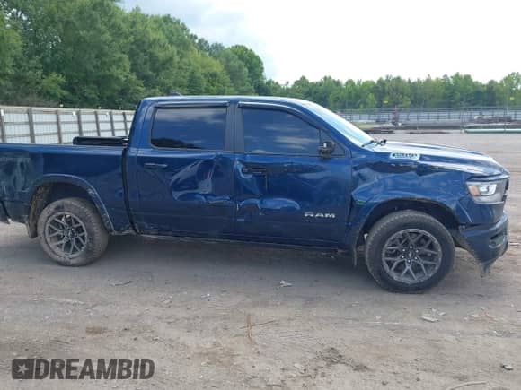 2020 Ram 1500 Laramie z VIN 1C6SRFJT4LN307504, wystawiony jako IAAI lot #42882754 z przebiegiem 100 563 mil mil oraz . Historia ofert i sprzedaży dostępna na DreamBid. Obrazek 13.