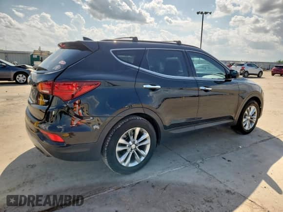 2017 Hyundai Santa Fe 2.0T with VIN 5XYZU3LA4HG379527, listed as a Copart auction lot 64012305 with 143,998 mi miles and Salvage title. Bid and sale history available at DreamBid. Image 3.