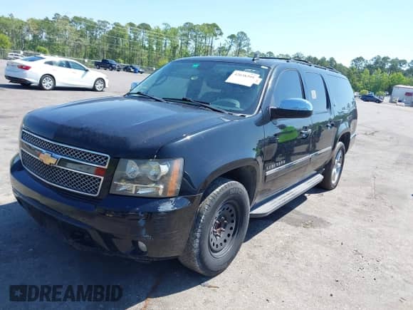2011 Chevrolet Suburban LTZ с VIN 1GNSCKE01BR275919, выставлен на аукционе IAAI как лот 42038399 с пробегом 247 841 миль миль и . История ставок и продаж доступна на DreamBid. Изображение 17.