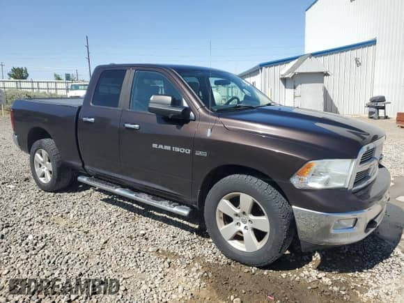2011 Ram 1500 Big Horn с VIN 1D7RV1GT5BS666587, выставлен на аукционе Copart как лот 66126325 с пробегом 189 527 миль миль и Списание • Salvage title. История ставок и продаж доступна на DreamBid. Изображение 4.