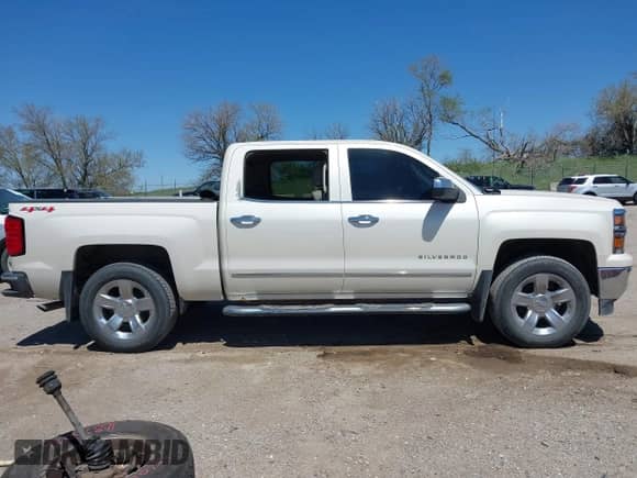 2014 Chevrolet Silverado 1500 LTZ z VIN 3GCUKSEJ0EG439324, wystawiony jako IAAI lot #42148611 z przebiegiem 176 409 mil mil oraz . Historia ofert i sprzedaży dostępna na DreamBid. Obrazek 13.