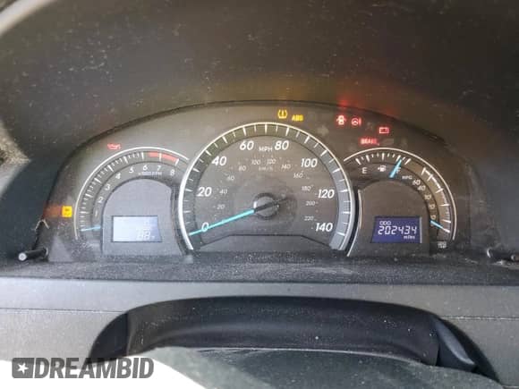 2012 Toyota Camry L z VIN 4T1BF1FK9CU038051, wystawiony jako Copart lot #82194655 z przebiegiem 202 434 mil mil oraz Czysty tytuł • Clean title. Historia ofert i sprzedaży dostępna na DreamBid. Obrazek 9.