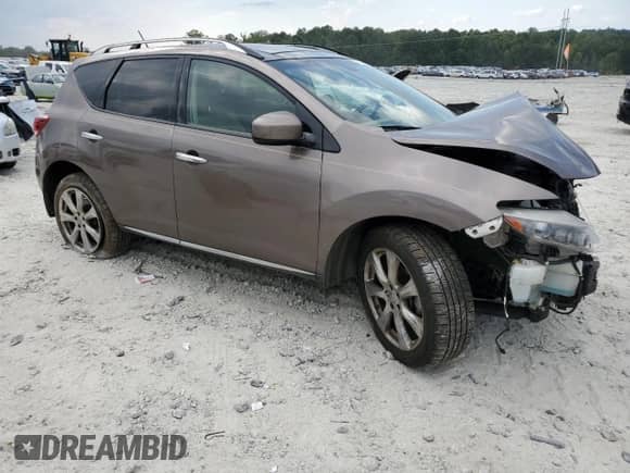 2012 Nissan Murano SL with VIN JN8AZ1MW1CW218985, listed as a Copart auction lot 70963705 with 105,426 mi miles and Salvage title. Bid and sale history available at DreamBid. Image 4.