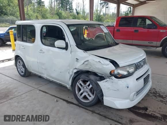 2009 Nissan Cube SL с VIN JN8AZ28R59T114567, выставлен на аукционе IAAI как лот 42594407 с пробегом 143 808 миль миль и . История ставок и продаж доступна на DreamBid. Изображение 1.