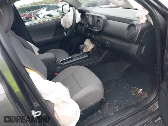 2023 Toyota Tacoma SR with VIN 3TYSX5EN6PT021792, listed as a IAAI auction lot 43037546 with 20,673 mi miles and . Bid and sale history available at DreamBid. Image 5.