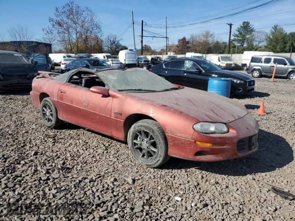 2002 Chevrolet Camaro Z28 z VIN 2G1FP22G322161044, wystawiony jako Copart lot #78297574 z przebiegiem 34 002 mil mil oraz Szkoda całkowita • Salvage title. Historia ofert i sprzedaży dostępna na DreamBid. Obrazek 4.