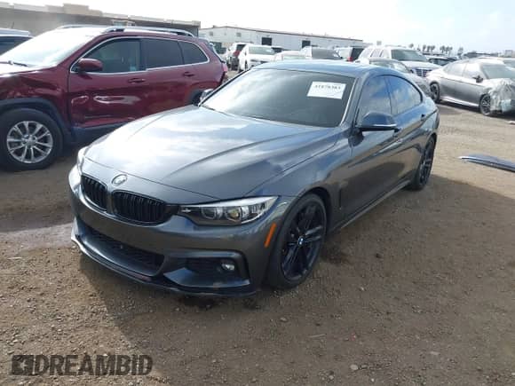2018 BMW 4 Series 440i with VIN WBA4J5C55JBF07372, listed as a IAAI auction lot 41878383 with 68,043 mi miles and . Bid and sale history available at DreamBid. Image 18.