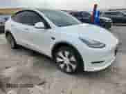 2022 Tesla Model Y Long Range с VIN 7SAYGDEE7NF313908, выставлен на аукционе Copart как лот 71536385 с пробегом Не указан миль и Списание • Salvage title. История ставок и продаж доступна на DreamBid. Изображение 4.