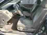 1999 Honda Accord LX with VIN 1HGCG6654XA061517, listed as a Copart auction lot 67732945 with 124,252 mi miles and Salvage title. Bid and sale history available at DreamBid. Image 7.