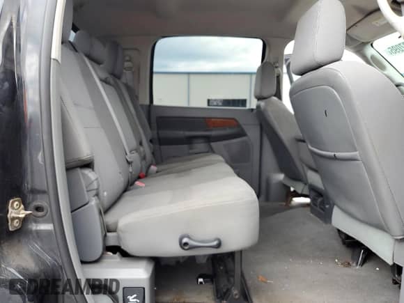 2006 Dodge 1500 SLT с VIN 3D7KR19D96G217308, выставлен на аукционе Copart как лот 69437095 с пробегом 171 973 миль миль и Списание • Salvage title. История ставок и продаж доступна на DreamBid. Изображение 10.