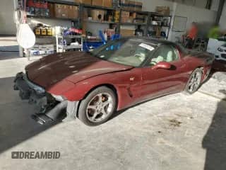 2003 Chevrolet Corvette z VIN 1G1YY22G535127764, wystawiony jako Copart lot #81563115 z przebiegiem 102 013 mil mil oraz Szkoda całkowita • Salvage title. Historia ofert i sprzedaży dostępna na DreamBid. Obrazek 1.