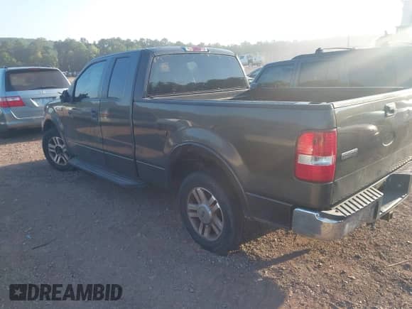 2005 Ford F-150 XLT with VIN 1FTPX12535FB71693, listed as a IAAI auction lot 43132554 with 179,736 mi miles and . Bid and sale history available at DreamBid. Image 3.