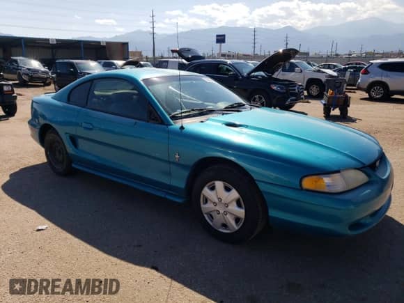 1994 Ford Mustang z VIN 1FALP4045RF130357, wystawiony jako Copart lot #70832464 z przebiegiem 112 148 mil mil oraz Szkoda całkowita • Salvage title. Historia ofert i sprzedaży dostępna na DreamBid. Obrazek 4.