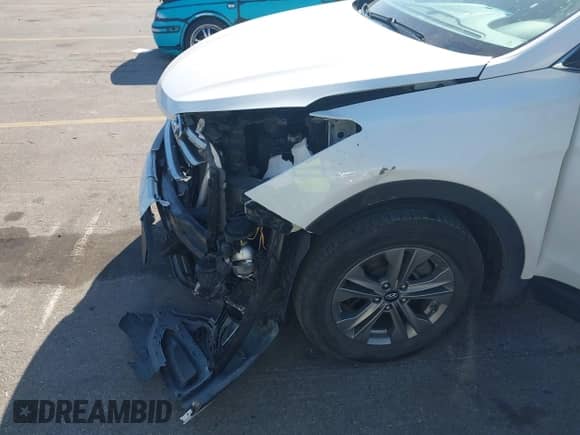 2016 Hyundai Santa Fe z VIN 5XYZTDLB5GG353924, wystawiony jako IAAI lot #43070368 z przebiegiem 102 314 mil mil oraz . Historia ofert i sprzedaży dostępna na DreamBid. Obrazek 6.