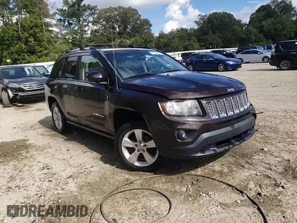 2014 Jeep Compass Latitude with VIN 1C4NJCEA4ED643134, listed as a Copart auction lot 71044335 with 103,025 mi miles and Salvage title. Bid and sale history available at DreamBid. Image 14.