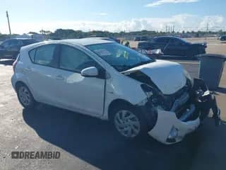 2015 Toyota Prius One z VIN JTDKDTB35F1096832, wystawiony jako IAAI lot #43372835 z przebiegiem 205 009 mil mil oraz . Historia ofert i sprzedaży dostępna na DreamBid. Obrazek 1.