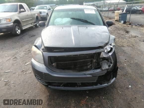 2011 Dodge Caliber z VIN 1B3CB1HA1BD254341, wystawiony jako IAAI lot #42113044 z przebiegiem 296 415 mil mil oraz . Historia ofert i sprzedaży dostępna na DreamBid. Obrazek 12.