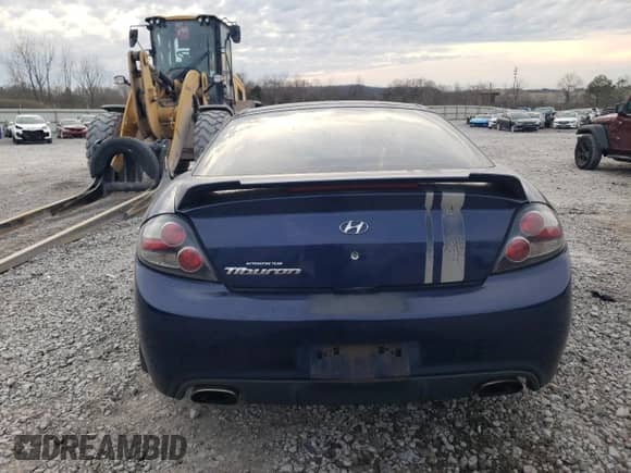 2007 Hyundai Tiburon GS с VIN KMHHM66D97U260559, выставлен на аукционе Copart как лот 43320165 с пробегом 181 148 миль миль и Списание • Salvage title. История ставок и продаж доступна на DreamBid. Изображение 6.