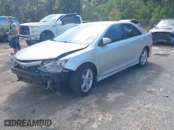 2014 Toyota Camry L with VIN 4T1BF1FK5EU857092, listed as a IAAI auction lot 43274875 with 151,925 mi miles and . Bid and sale history available at DreamBid. Image 2.