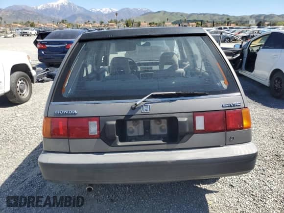 1990 Honda Civic with VIN JHMEE2752LS001520, listed as a Copart auction lot 50095545 with 456,252 mi miles and Salvage title. Bid and sale history available at DreamBid. Image 6.