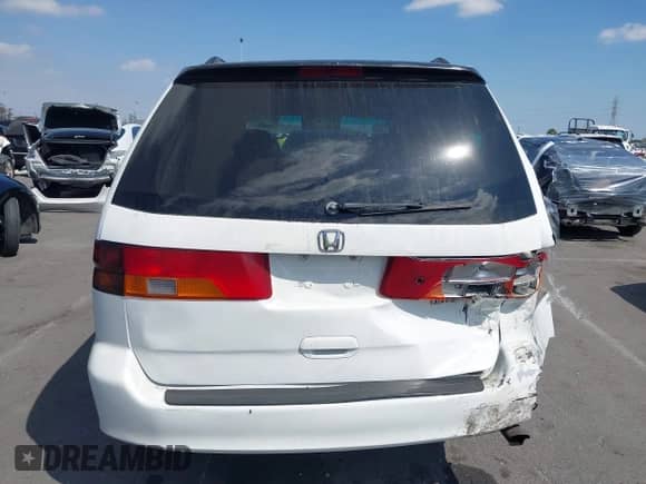 2002 Honda Odyssey EX with VIN 5FNRL18622B003502, listed as a IAAI auction lot 43216604 with 435,022 mi miles and . Bid and sale history available at DreamBid. Image 16.
