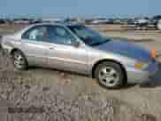 1997 Honda Accord Special Edition with VIN 1HGCD5608VA053067, listed as a Copart auction lot 70016605 with 144,073 mi miles and Salvage title. Bid and sale history available at DreamBid. Image 4.