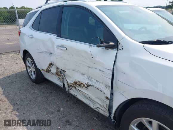 2021 Chevrolet Equinox Premier with VIN 3GNAXNEV1MS158581, listed as a IAAI auction lot 42403077 with 116,161 mi miles and . Bid and sale history available at DreamBid. Image 6.