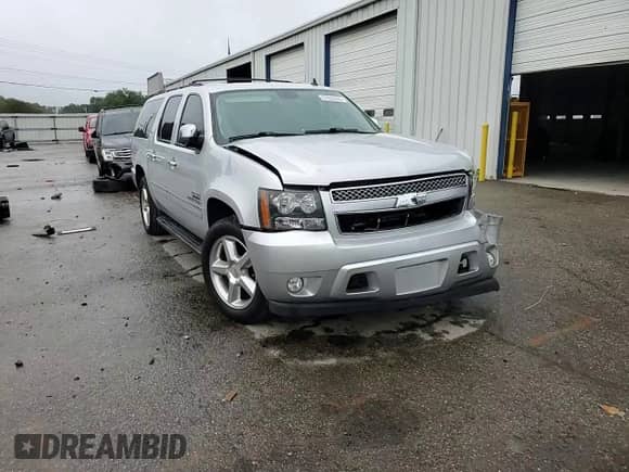 2014 Chevrolet Suburban LTZ с VIN 1GNSCKE05ER164696, выставлен на аукционе Copart как лот 67822465 с пробегом 133 217 миль миль и Списание • Salvage title. История ставок и продаж доступна на DreamBid. Изображение 15.