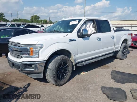 2018 Ford F-150 XL z VIN 1FTFW1EG0JKC58870, wystawiony jako IAAI lot #43209369 z przebiegiem 122 374 mil mil oraz . Historia ofert i sprzedaży dostępna na DreamBid. Obrazek 2.