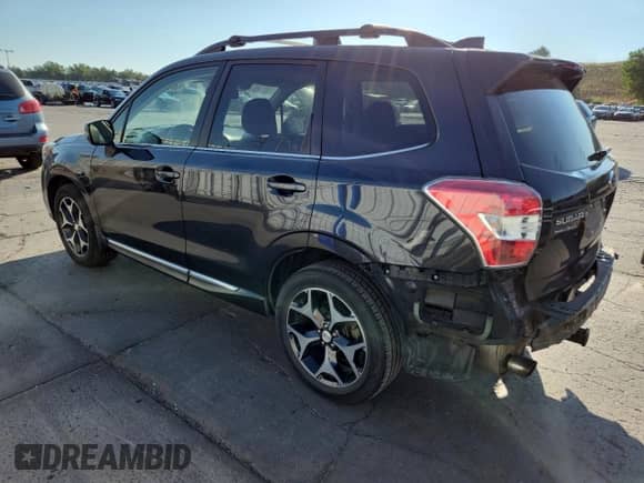 2016 Subaru Forester XT Touring with VIN JF2SJGXC4GH456384, listed as a Copart auction lot 70045345 with 107,427 mi miles and Salvage title. Bid and sale history available at DreamBid. Image 2.