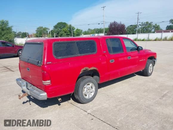 2001 Dodge Dakota Sport with VIN 1B7GL2AN61S102968, listed as a IAAI auction lot 42744852 with 208,364 mi miles and . Bid and sale history available at DreamBid. Image 4.