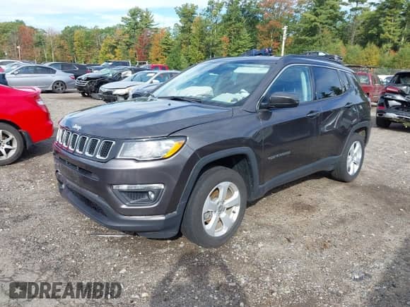 2021 Jeep Compass Altitude with VIN 3C4NJDBB2MT544968, listed as a IAAI auction lot 43290578 with 23,901 mi miles and . Bid and sale history available at DreamBid. Image 2.